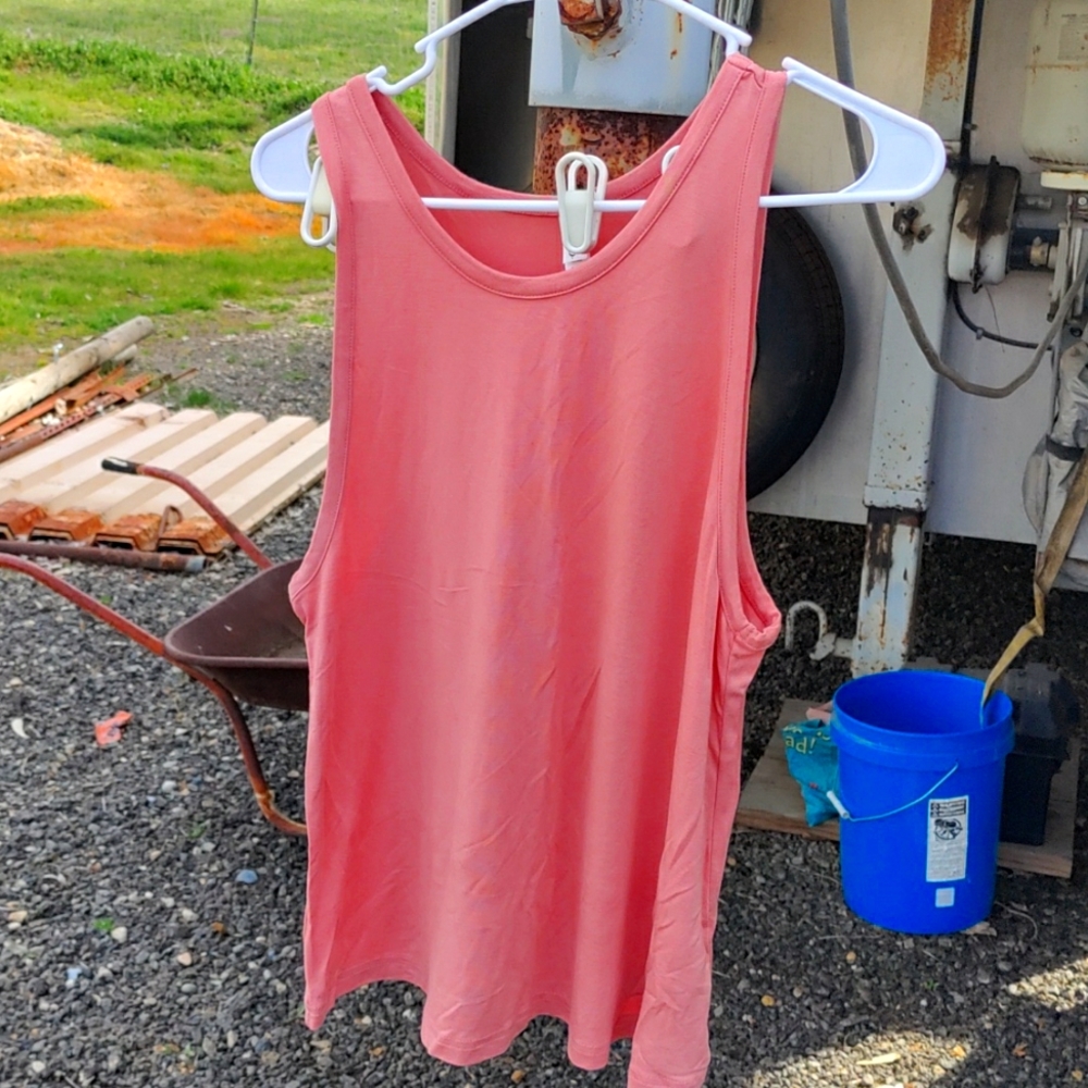 Salmon- colored tank top by...